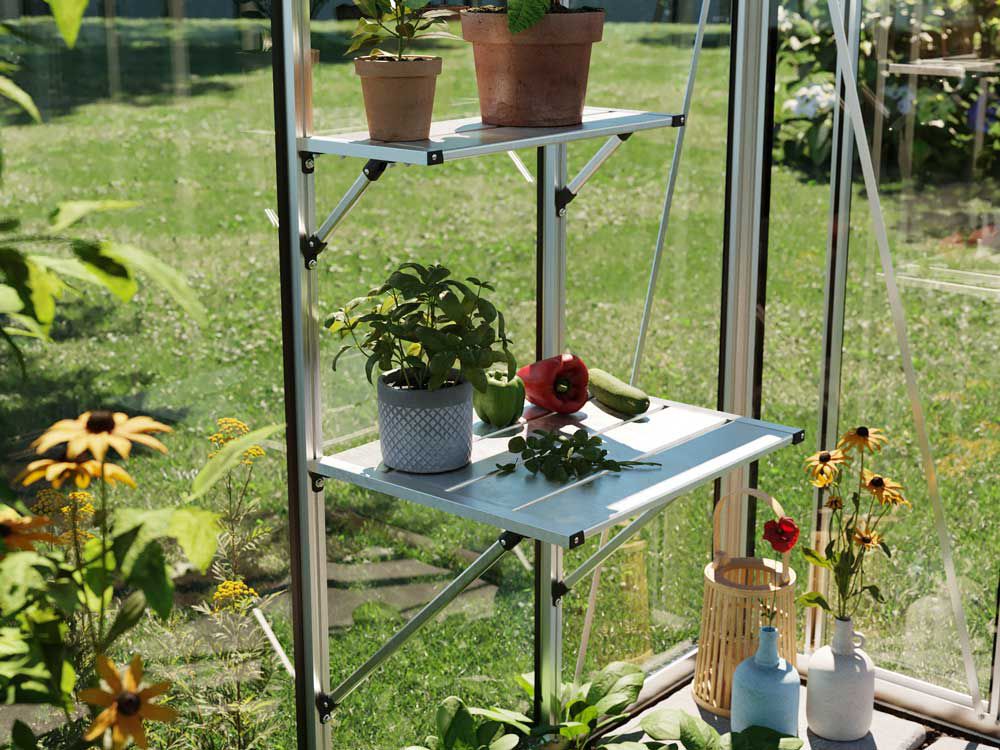 Eine einfache Ansicht eines Gartentisches mit einem darunter angebrachten Regal aus Aluminium. Die klare Gestaltung bietet sowohl Arbeitsfläche als auch Stauraum.